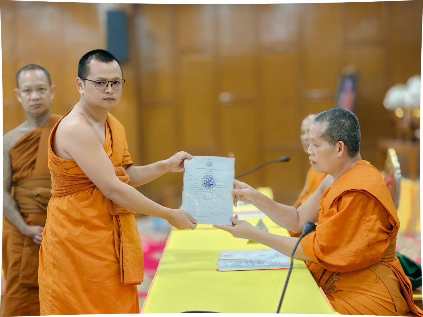 title - วันเสาร์ที่ 25 กรกฎาคม 2569 นายประเสริฐ กาญจนเกียรติกุล ปฏิรูปที่ดินจังหวัดบุรีรัมย์ พร้อมด้วยเจ้าหน้าที่ ส.ป.ก.บุรีรัมย์ มอบหนังสืออนุญาตให้ใช้ที่ดินเพื่อกิจการสาธารณูปโภค กรณีสำนักงานพระพุทธศาสนาแห่งชาติขอใช้ที่ดินเพื่อสร้างวัดจำนวน 7 วัด ในการประชุมคณะสงฆ์จังหวัดบุรีรัมย์ สมัยสามัญ ครั้งที่ 5 ปี 2569 ณ วัดกลาง พระอารามหลวง อำเภอเมืองบุรีรัมย์ จังหวัดบุรีรัมย์